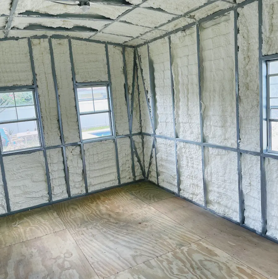 Closed-cell spray foam insulation applied to wall cavities in a residential project in Midland
